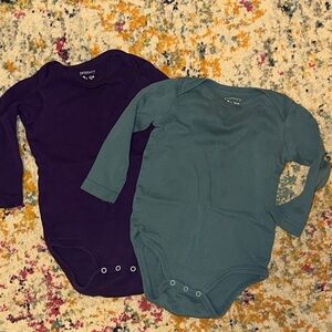 Two long sleeve Primary onesies